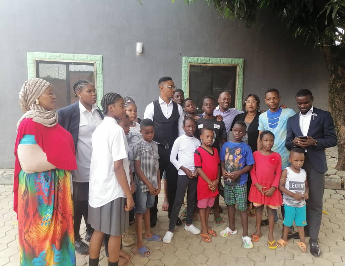 Kids Taken Group Photograph with Guest at the Orphanage Home